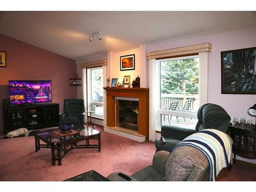 3021 214 Street, Bellevue, AB - Indoor Photo Showing Living Room With Fireplace