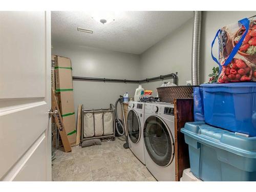 4918 40 Street, Taber, AB - Indoor Photo Showing Laundry Room