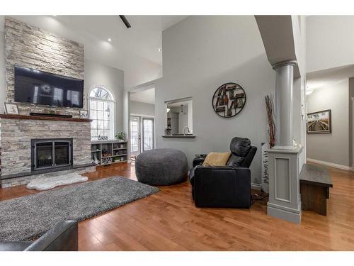 4918 40 Street, Taber, AB - Indoor Photo Showing Living Room With Fireplace