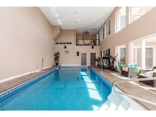 425 Arbourwood Terrace South, Lethbridge, AB - Indoor Photo Showing Other Room With In Ground Pool