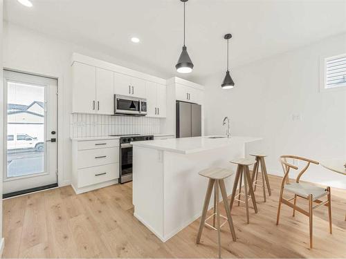 24 Blackwolf Lane North, Lethbridge, AB - Indoor Photo Showing Kitchen With Upgraded Kitchen