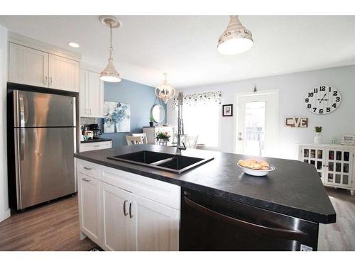 4310 Aspen Road, Coalhurst, AB - Indoor Photo Showing Kitchen With Double Sink