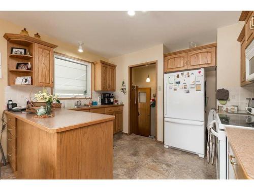 2216 28 Street South, Lethbridge, AB - Indoor Photo Showing Kitchen With Double Sink
