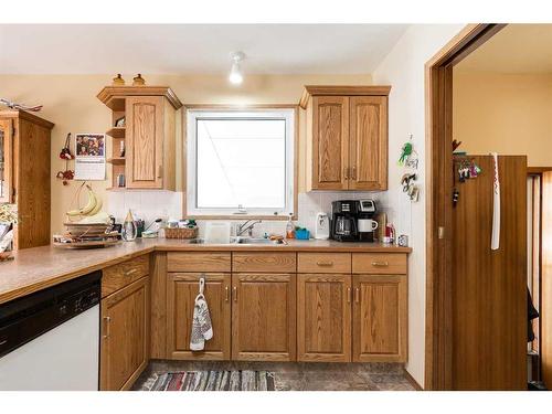 2216 28 Street South, Lethbridge, AB - Indoor Photo Showing Kitchen With Double Sink