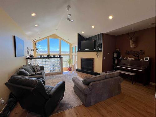 42016 Secondary Highway 820, Rural Cardston County, AB - Indoor Photo Showing Living Room With Fireplace