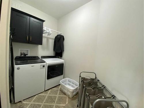 13 Grasslands Road, Rural Taber, M.D. Of, AB - Indoor Photo Showing Laundry Room