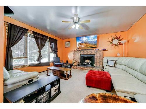 2934 222 Street, Bellevue, AB - Indoor Photo Showing Living Room With Fireplace