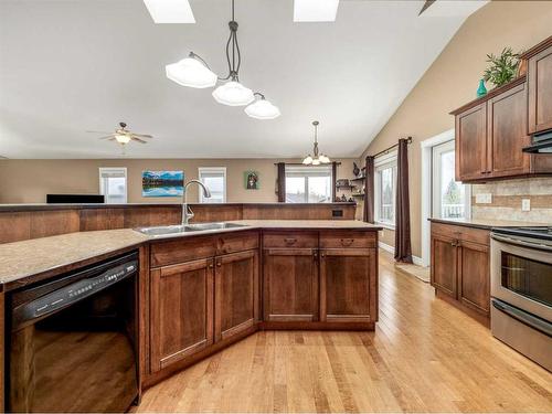 50 Waterfront Landing, Coaldale, AB - Indoor Photo Showing Kitchen With Double Sink