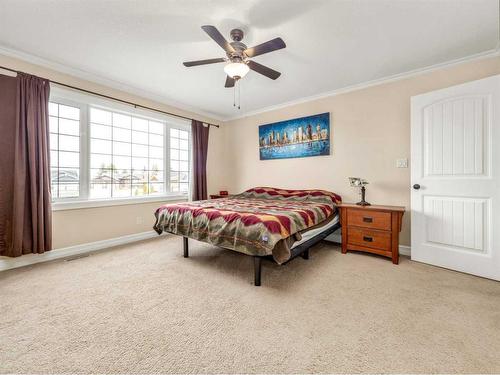 50 Waterfront Landing, Coaldale, AB - Indoor Photo Showing Bedroom