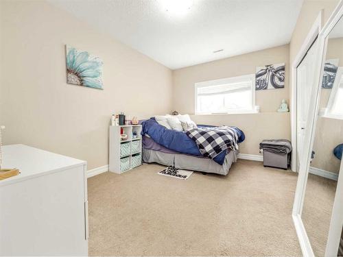 50 Waterfront Landing, Coaldale, AB - Indoor Photo Showing Bedroom