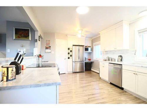771 Dundas Street, Pincher Creek, AB - Indoor Photo Showing Kitchen With Stainless Steel Kitchen