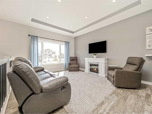 1026 7 Street West, Barnwell, AB - Indoor Photo Showing Living Room With Fireplace
