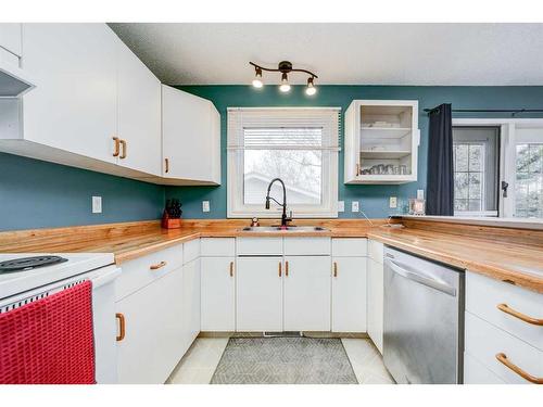 1709 21 A Street, Coaldale, AB - Indoor Photo Showing Kitchen With Double Sink