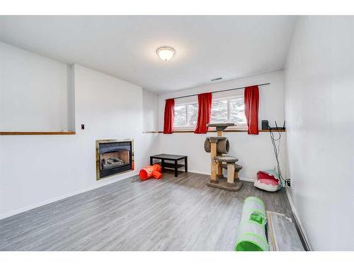 1709 21 A Street, Coaldale, AB - Indoor With Fireplace