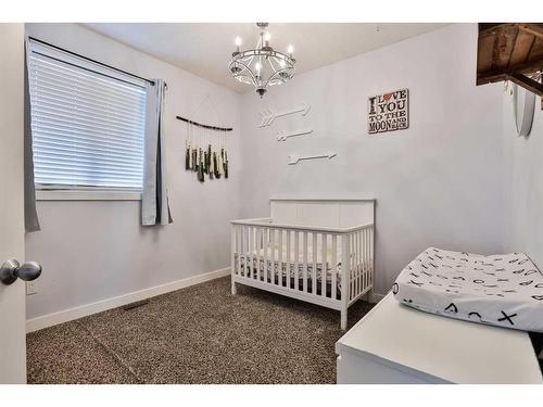 705 10 Avenue West, Barnwell, AB - Indoor Photo Showing Bedroom