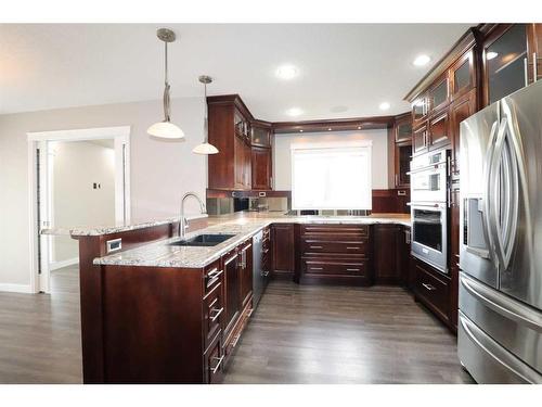 128 Gateway Mews South, Lethbridge, AB - Indoor Photo Showing Kitchen With Upgraded Kitchen