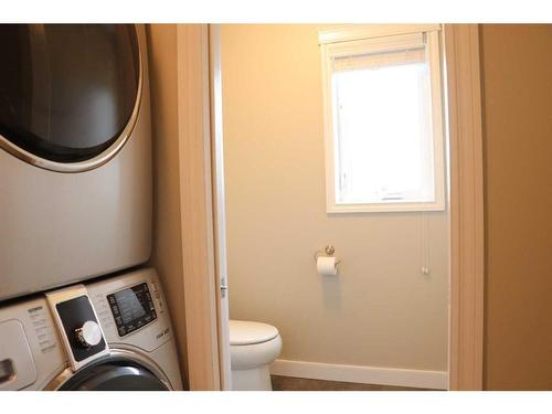 128 Gateway Mews South, Lethbridge, AB - Indoor Photo Showing Laundry Room