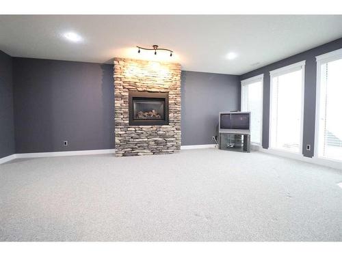 128 Gateway Mews South, Lethbridge, AB - Indoor With Fireplace