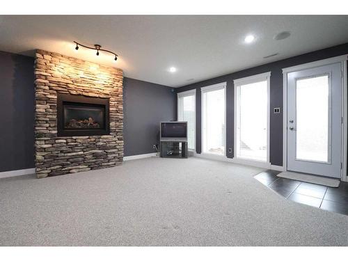 128 Gateway Mews South, Lethbridge, AB - Indoor With Fireplace