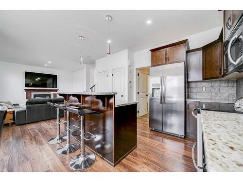306 Haru Moriyama Place North, Lethbridge, AB - Indoor Photo Showing Kitchen With Upgraded Kitchen