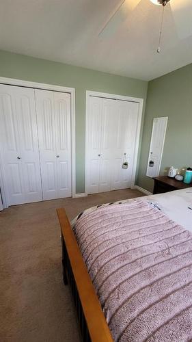 359 3 Avenue West, Cardston, AB - Indoor Photo Showing Bedroom