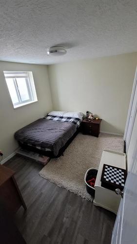 359 3 Avenue West, Cardston, AB - Indoor Photo Showing Bedroom