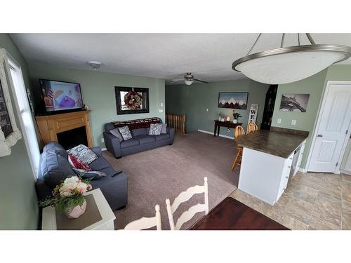 359 3 Avenue West, Cardston, AB - Indoor With Fireplace