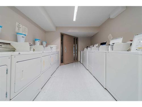 201-855 Columbia Boulevard West, Lethbridge, AB - Indoor Photo Showing Laundry Room