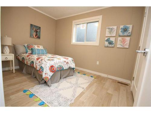 14 Meadows Crescent, Taber, AB - Indoor Photo Showing Bedroom