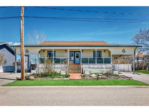 338 4A Street, Stirling, AB - Outdoor With Deck Patio Veranda With Facade