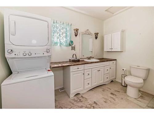 338 4A Street, Stirling, AB - Indoor Photo Showing Laundry Room