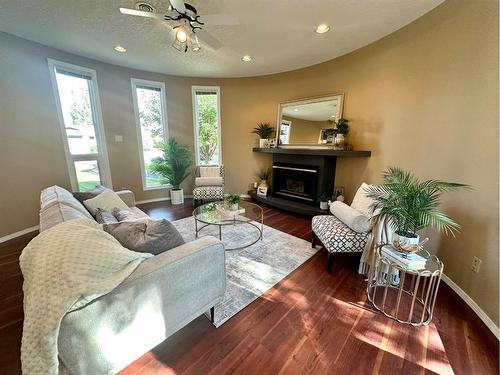 14 Kings Road South, Lethbridge, AB - Indoor Photo Showing Living Room With Fireplace