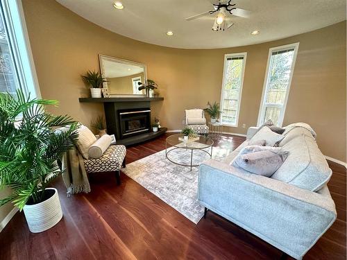 14 Kings Road South, Lethbridge, AB - Indoor Photo Showing Living Room With Fireplace