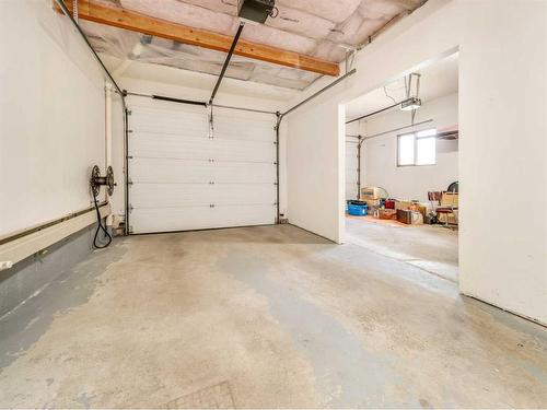 14 Kings Road South, Lethbridge, AB - Indoor Photo Showing Garage