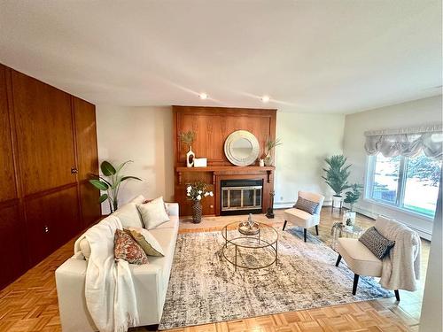 14 Kings Road South, Lethbridge, AB - Indoor Photo Showing Living Room With Fireplace