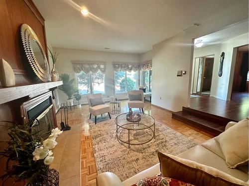 14 Kings Road South, Lethbridge, AB - Indoor Photo Showing Living Room With Fireplace