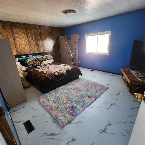 5303 54 Street, Taber, AB - Indoor Photo Showing Bedroom