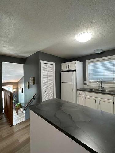 71 Princeton Crescent West, Lethbridge, AB - Indoor Photo Showing Kitchen With Double Sink