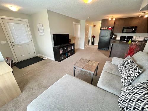 238-300 Marina Drive, Chestermere, AB - Indoor Photo Showing Living Room