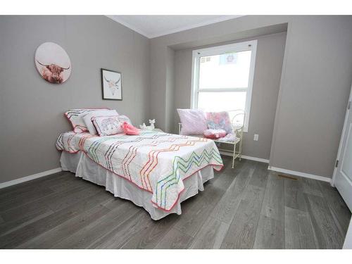 7049 48 Street, Taber, AB - Indoor Photo Showing Bedroom