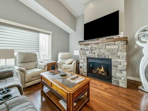 419 Dieppe Boulevard South, Lethbridge, AB - Indoor Photo Showing Living Room With Fireplace