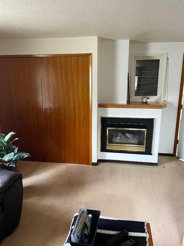 2127 5A Avenue North, Lethbridge, AB - Indoor With Fireplace