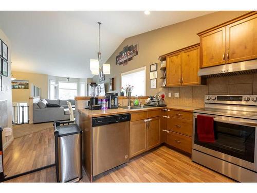138 Silkstone Road West, Lethbridge, AB - Indoor Photo Showing Kitchen With Double Sink