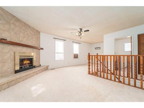 542 12 Street North, Lethbridge, AB - Indoor With Fireplace
