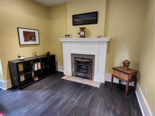 419 12C Street North, Lethbridge, AB - Indoor Photo Showing Other Room With Fireplace