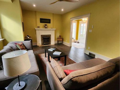 419 12C Street North, Lethbridge, AB - Indoor Photo Showing Living Room With Fireplace