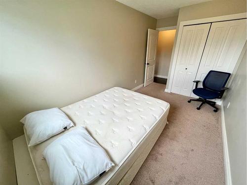 107A-295 Columbia Boulevard West, Lethbridge, AB - Indoor Photo Showing Bedroom