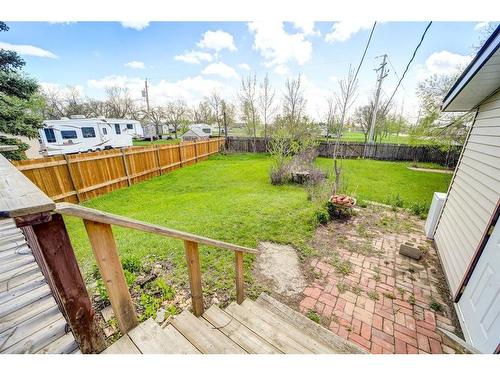 4622 4 Street, Claresholm, AB - Outdoor With Backyard