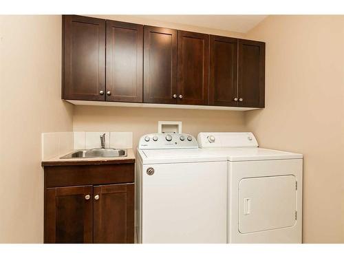 13-240 Heritage Boulevard West, Lethbridge, AB - Indoor Photo Showing Laundry Room