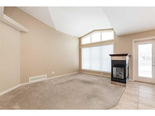 13-240 Heritage Boulevard West, Lethbridge, AB - Indoor With Fireplace